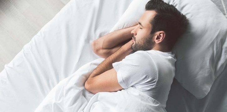 cuteyoungmansleepingonbed-2
