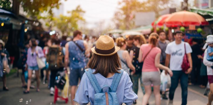 young-woman-traveler-with-sky-blue-backpack-and-hat-looking-the-way-with-in-jj-market-in-bangkok-thailand-traveling-in-bangkok-thailand-2