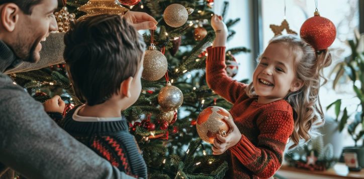 father-daughter-decorating-christmas-tree-family-decorating-christmas-tree-together-laughing-singing-carols-as-they-hang-ornaments-string-lights-2